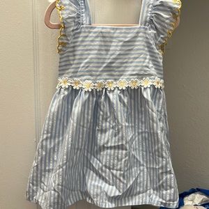 Members mark 2T dress
